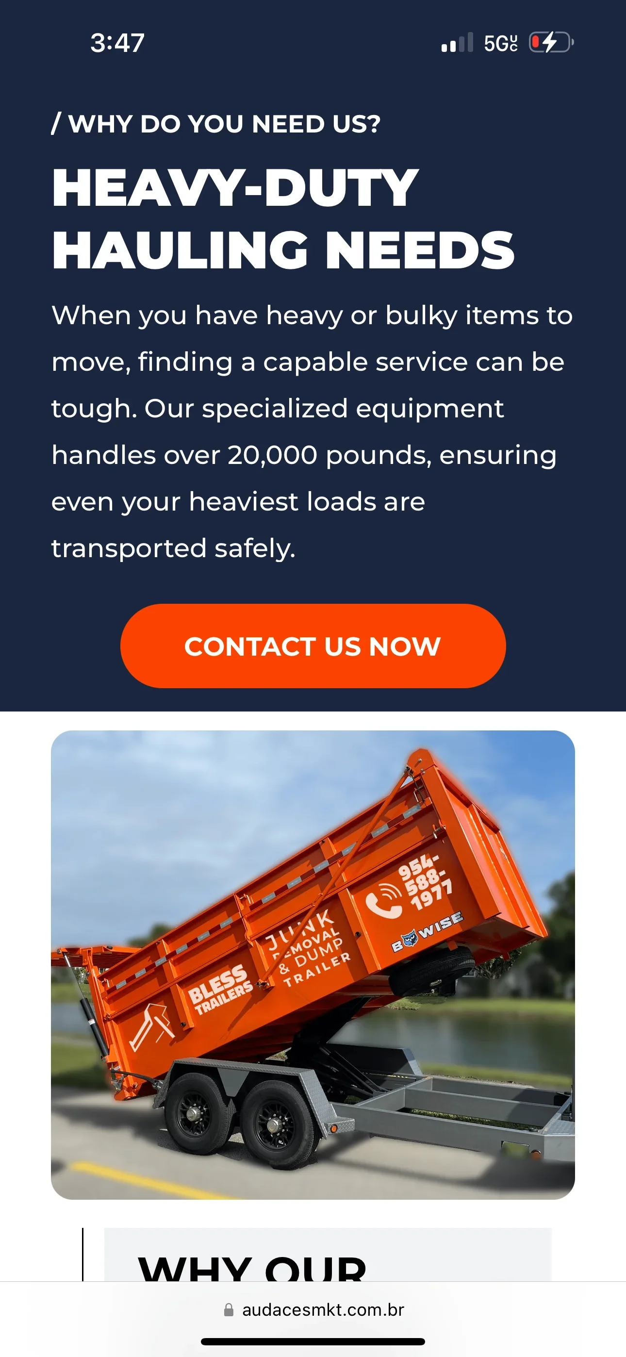 Orange tandem-axle dump trailer with hydraulic lift system raised, steel construction and side gates visible